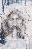 San Bol: Verwittertes Jesusportrait auf einer Betonmauer